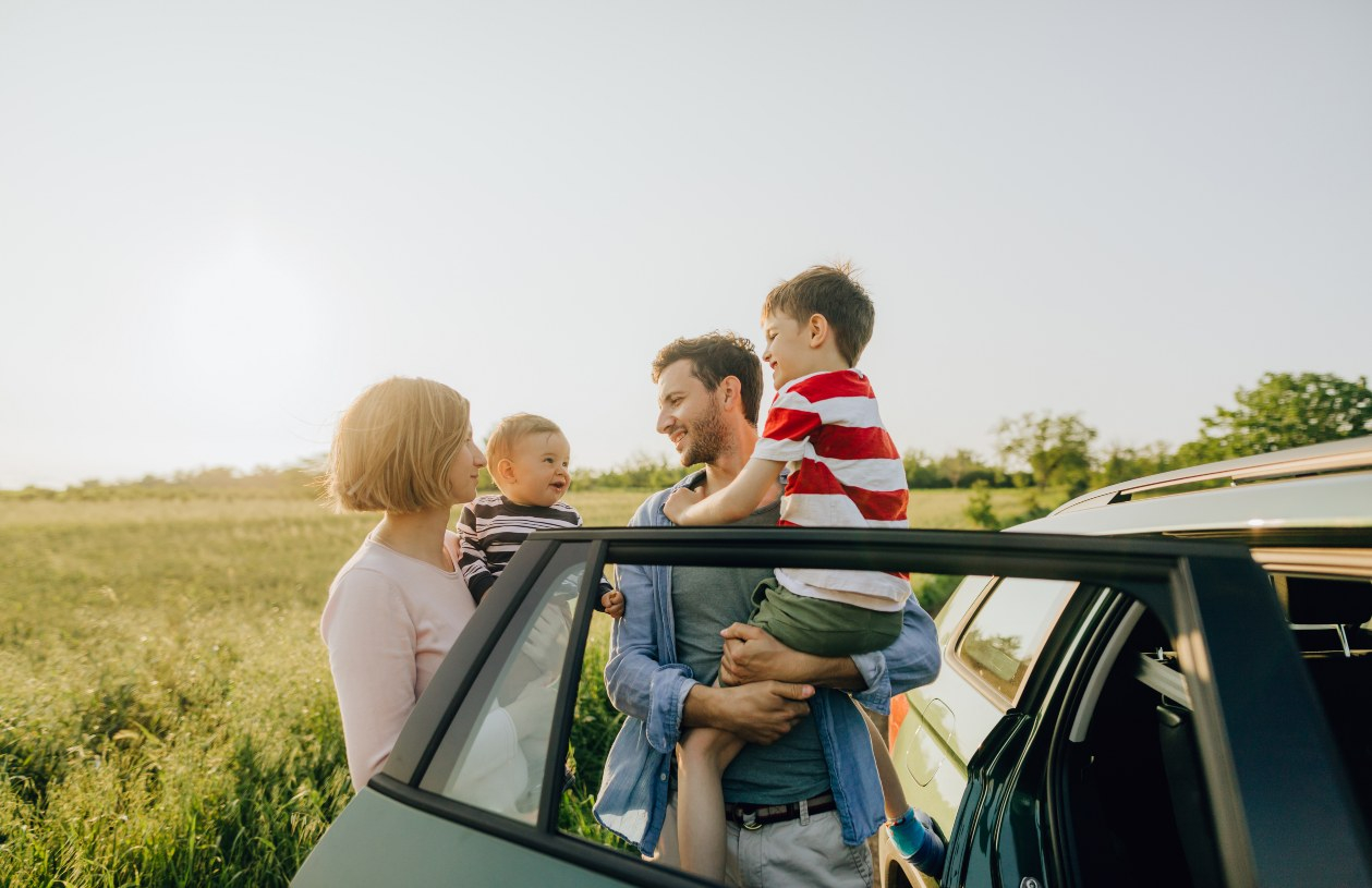 A family enjoys their car after they buy out a car lease.