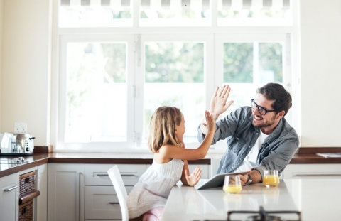 Parent teaches child about money