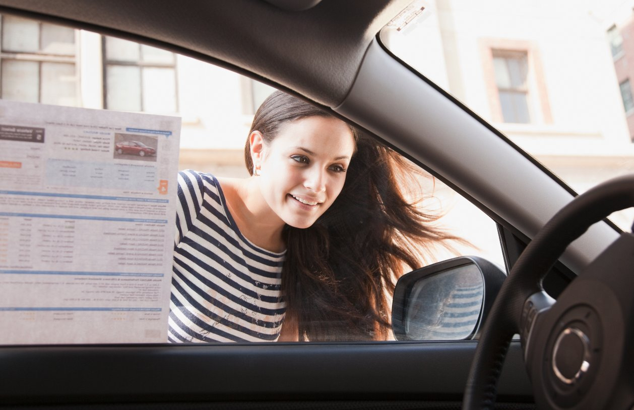 A woman decides to lease or buy a car 