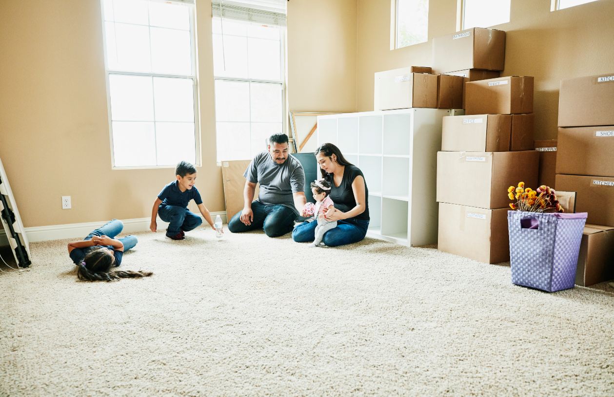 A family prepares to move after selling their home.
